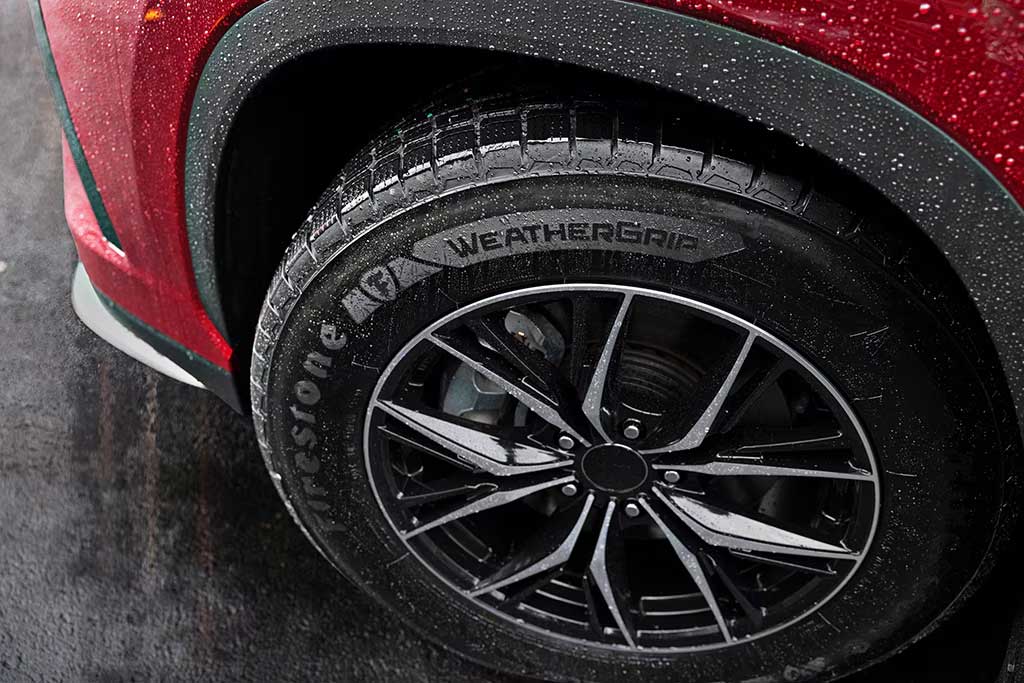 <strong>Firestone WeatherGrip</strong> tire in rain